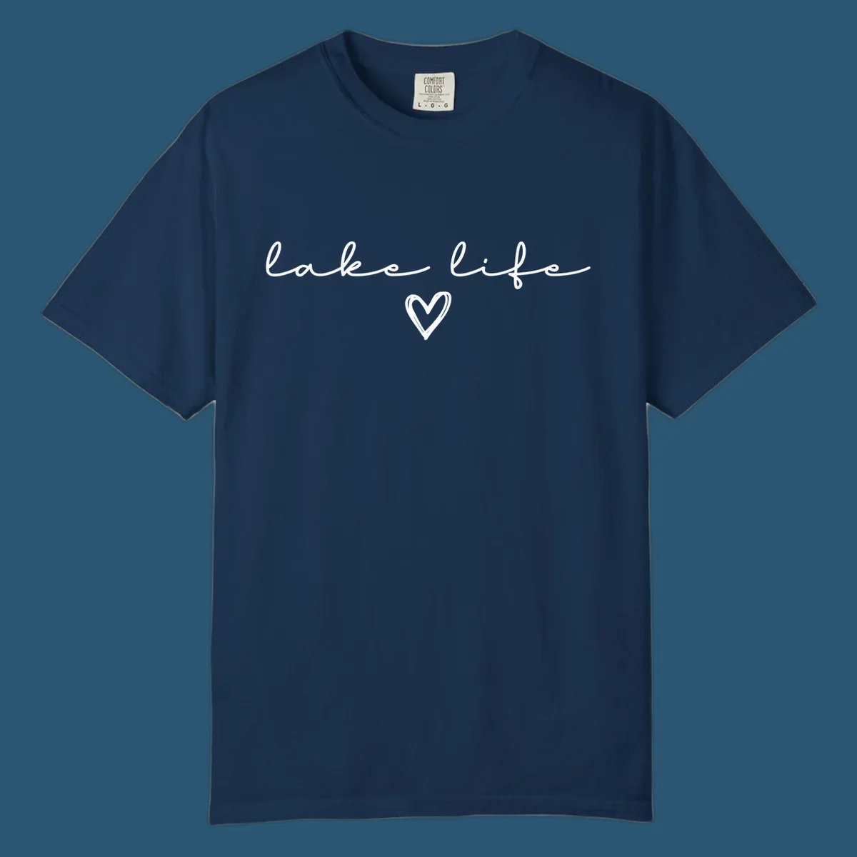Lake life text with a heart graphic, in white and navy.