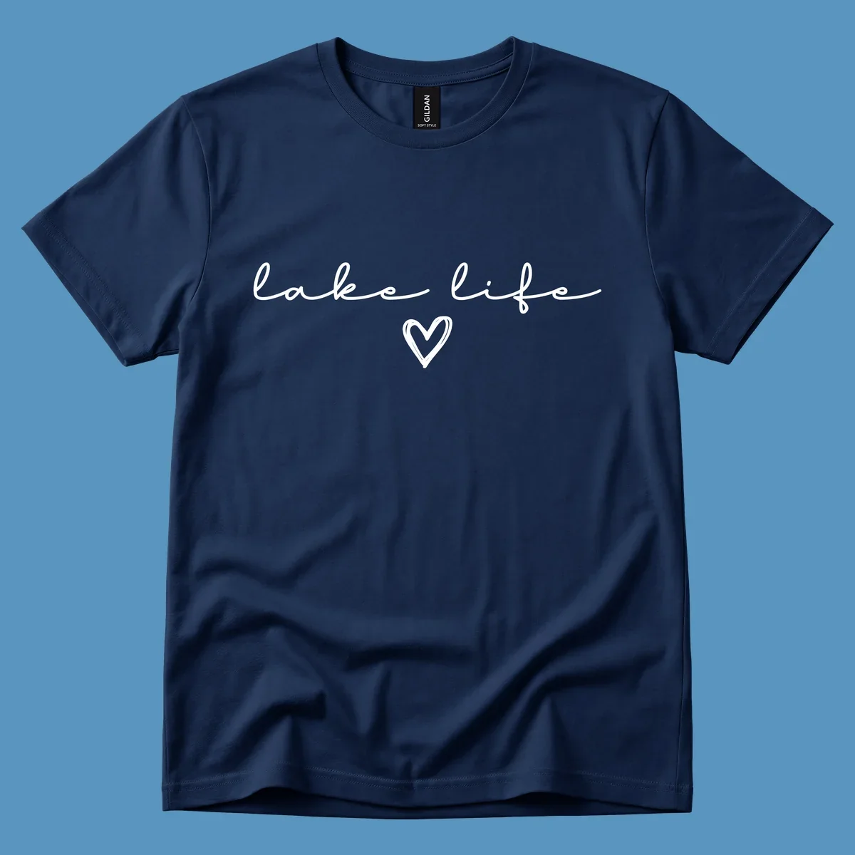 Lake life text with a heart graphic, in white and navy.