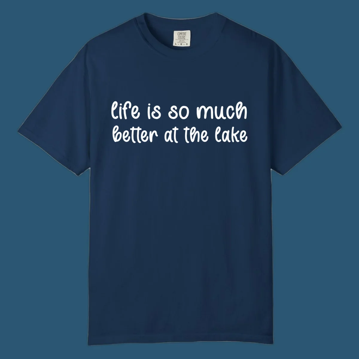 Typography design with the phrase "life is so much better at the lake" in a casual script font.