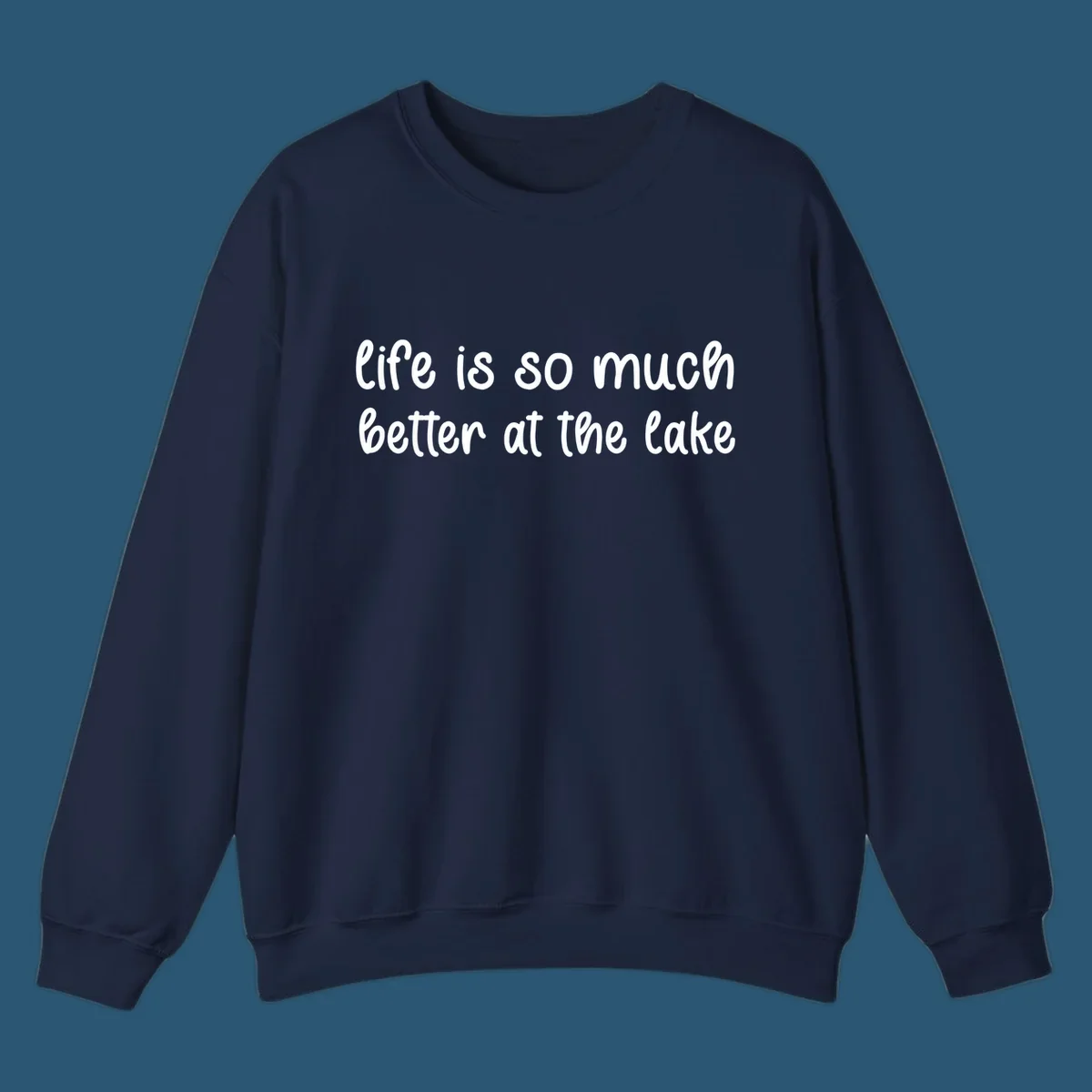 Typography design with the phrase "life is so much better at the lake" in a casual script font.