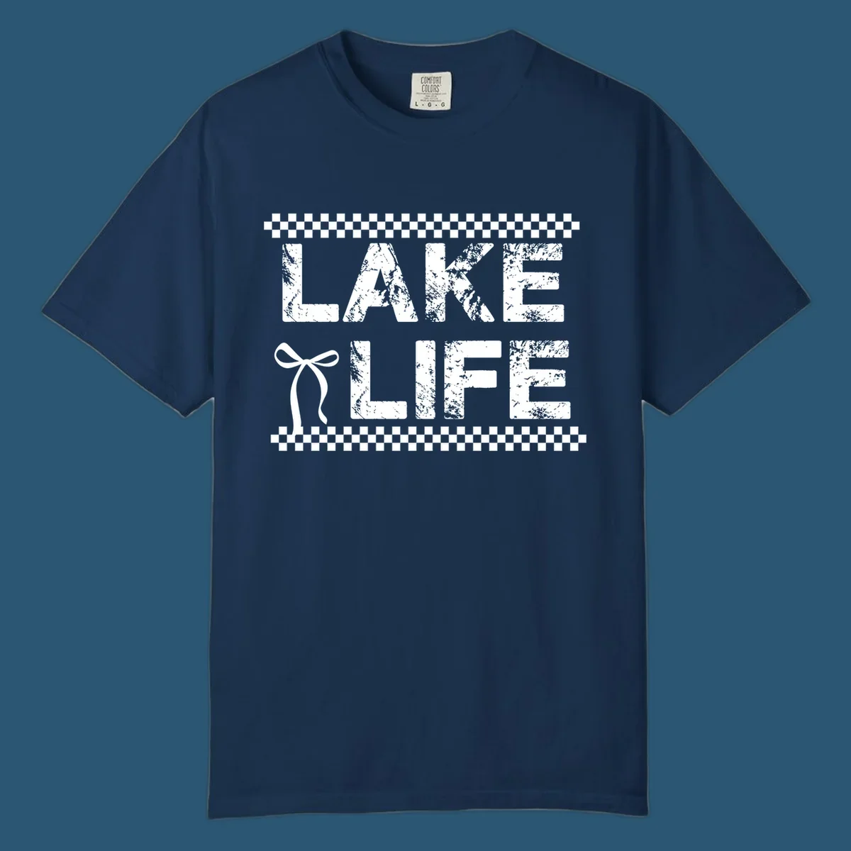 Lake Life text with bow accent and checkerboard border, distressed font.