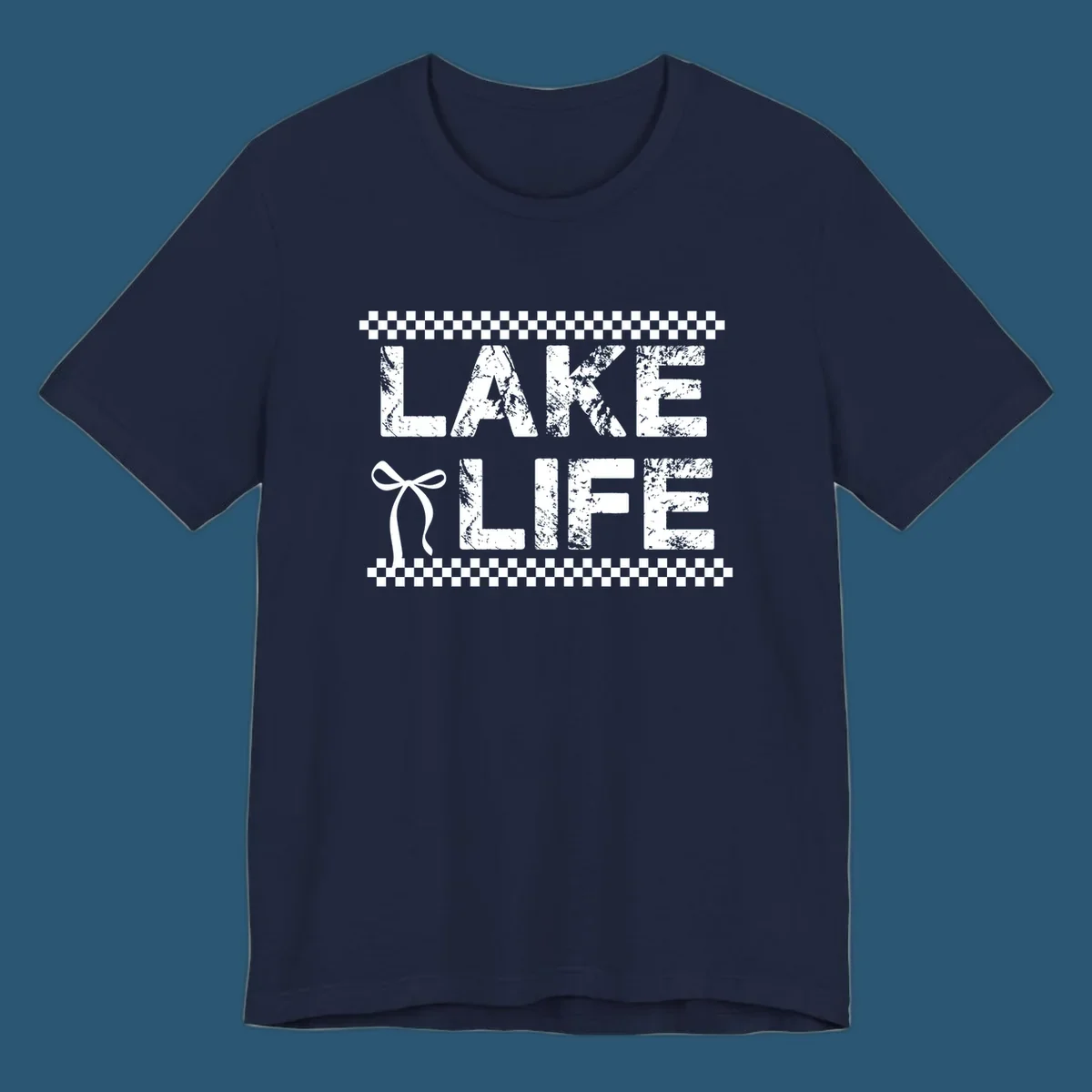 Lake Life text with bow accent and checkerboard border, distressed font.