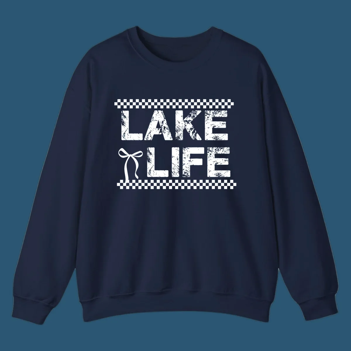 Lake Life text with bow accent and checkerboard border, distressed font.