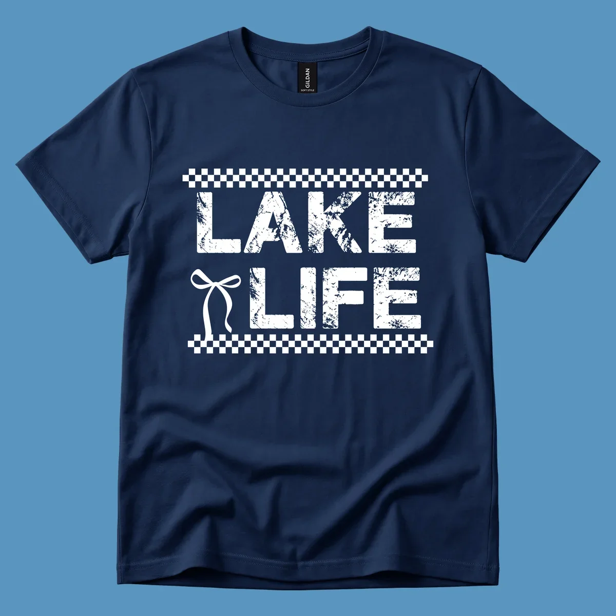 Lake Life text with bow accent and checkerboard border, distressed font.