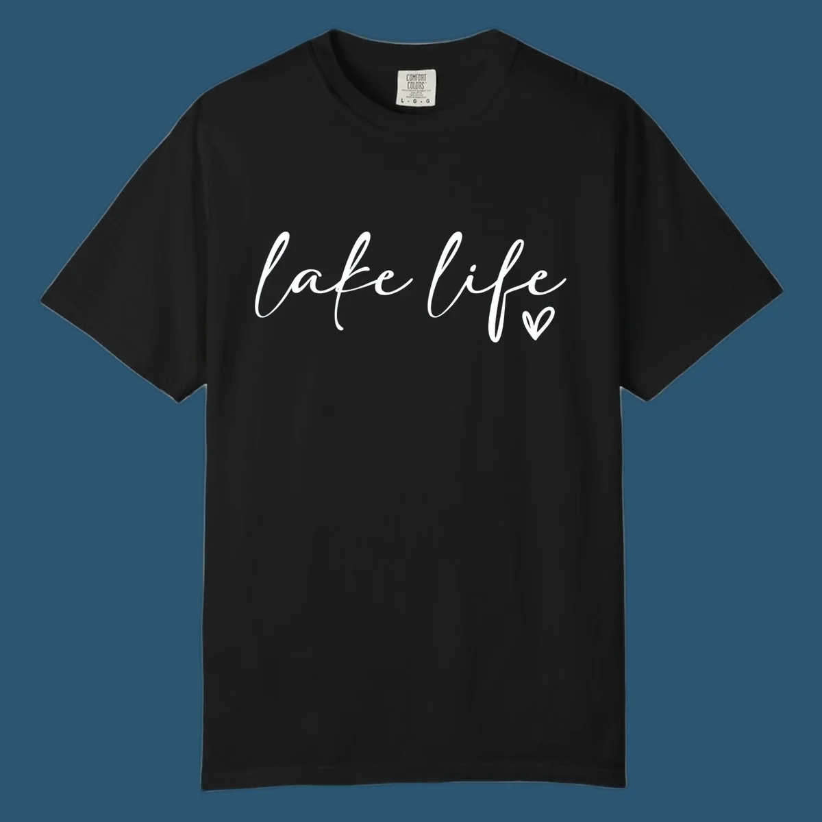 White script text reading 'lake life' with a small heart icon, on a black background.