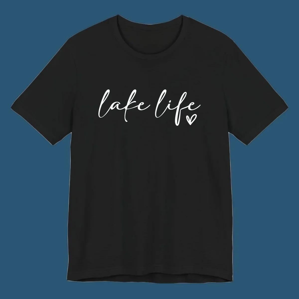 White script text reading 'lake life' with a small heart icon, on a black background.