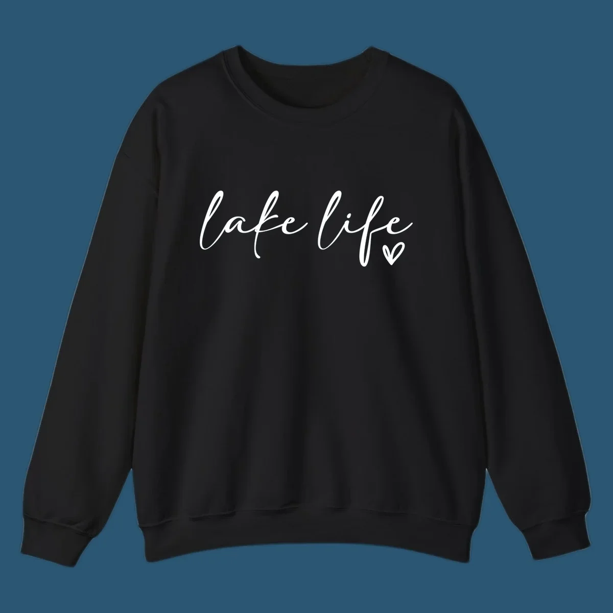 White script text reading 'lake life' with a small heart icon, on a black background.