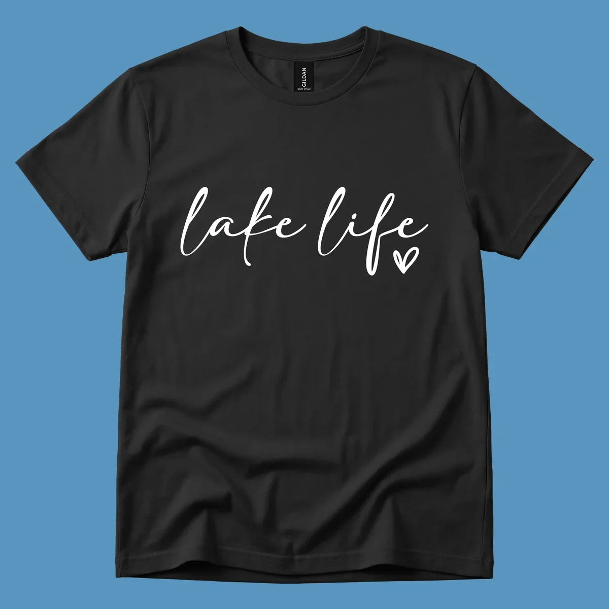 White script text reading 'lake life' with a small heart icon, on a black background.