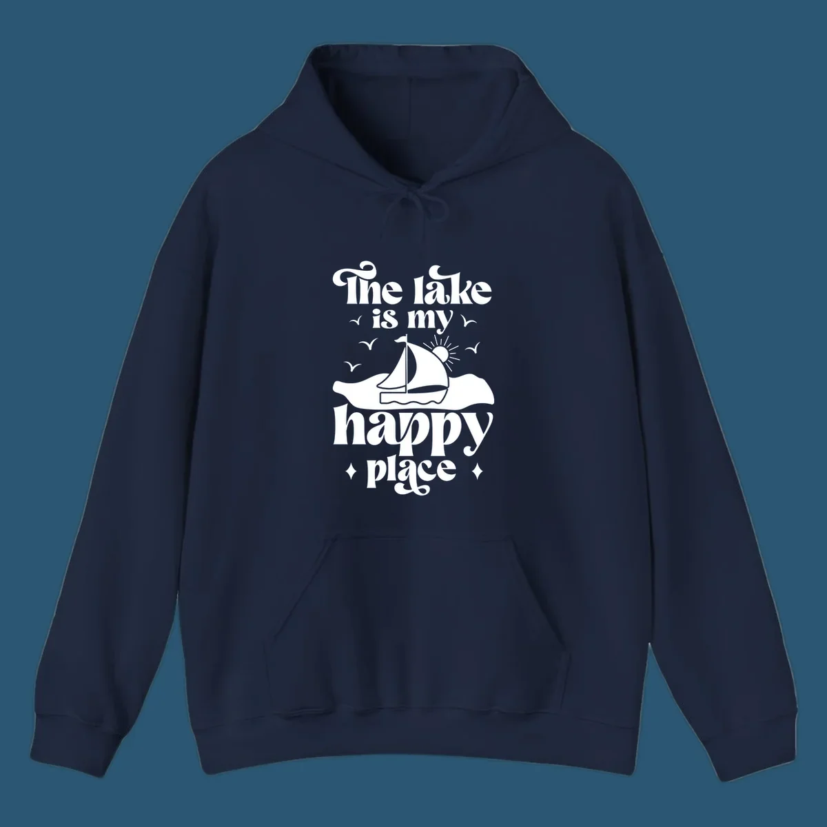 Retro text design 'The lake is my happy place' with sailboat, sun, and birds.