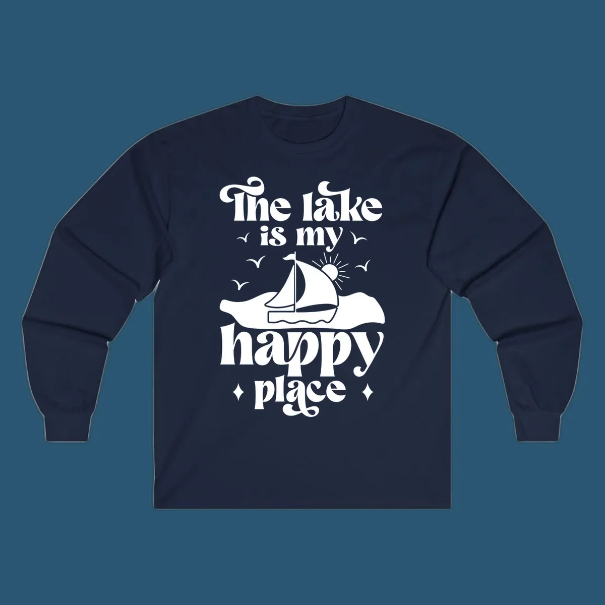 Retro text design 'The lake is my happy place' with sailboat, sun, and birds.