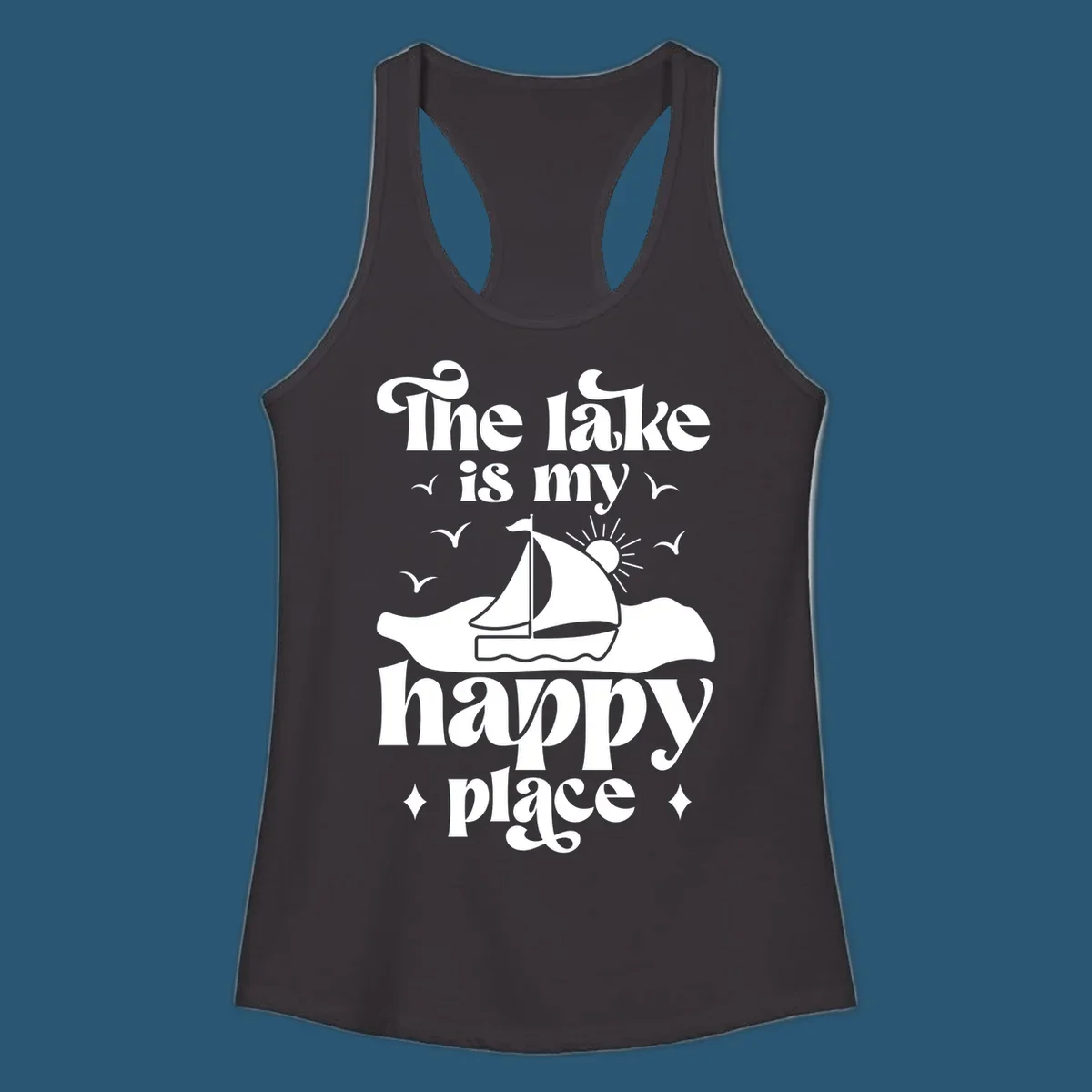 Retro text design 'The lake is my happy place' with sailboat, sun, and birds.