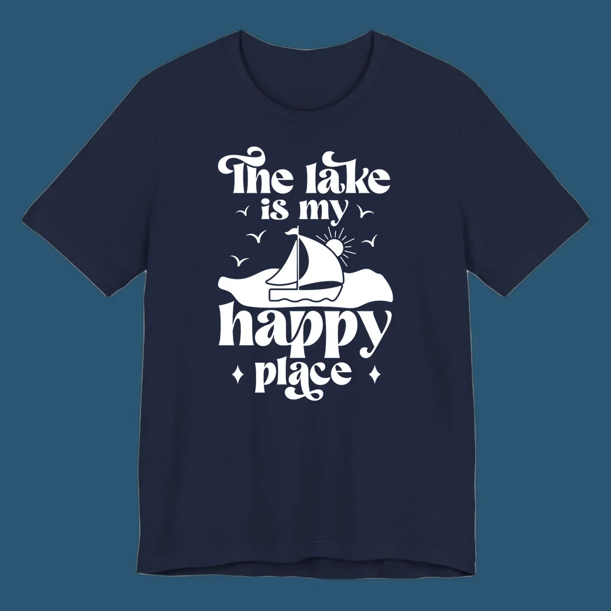 Retro text design 'The lake is my happy place' with sailboat, sun, and birds.