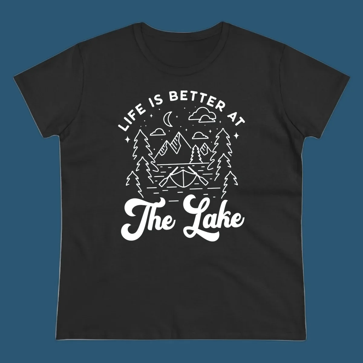 Lake life graphic with mountains, canoe, moon, and text 'Life Is Better At The Lake'.