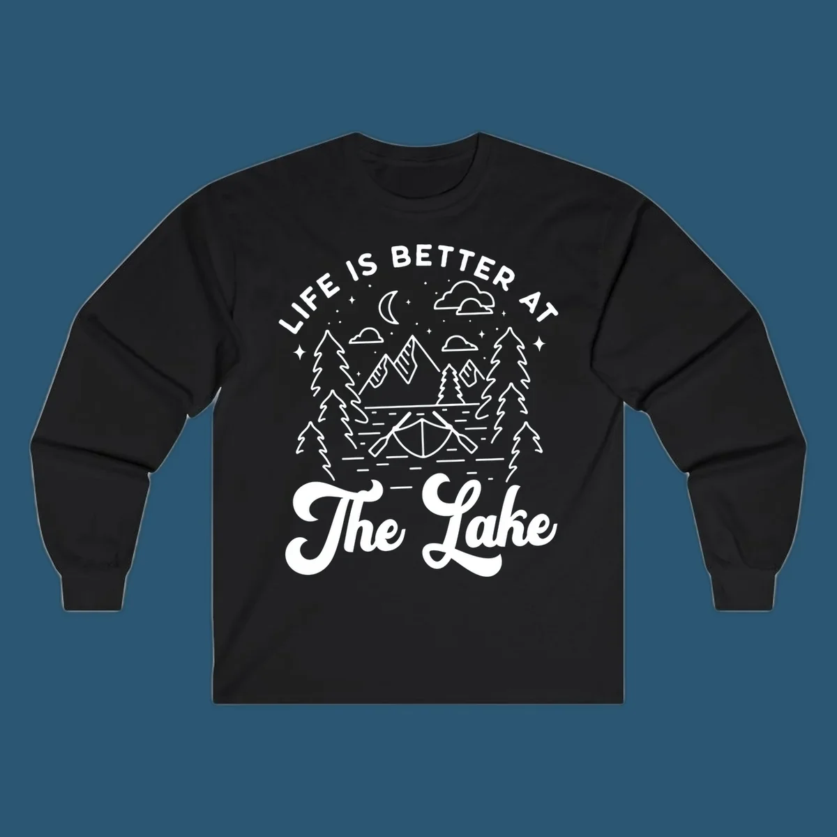 Lake life graphic with mountains, canoe, moon, and text 'Life Is Better At The Lake'.