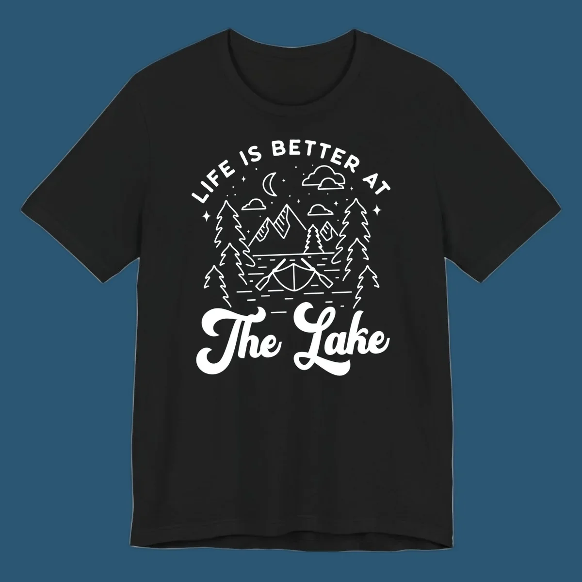 Lake life graphic with mountains, canoe, moon, and text 'Life Is Better At The Lake'.