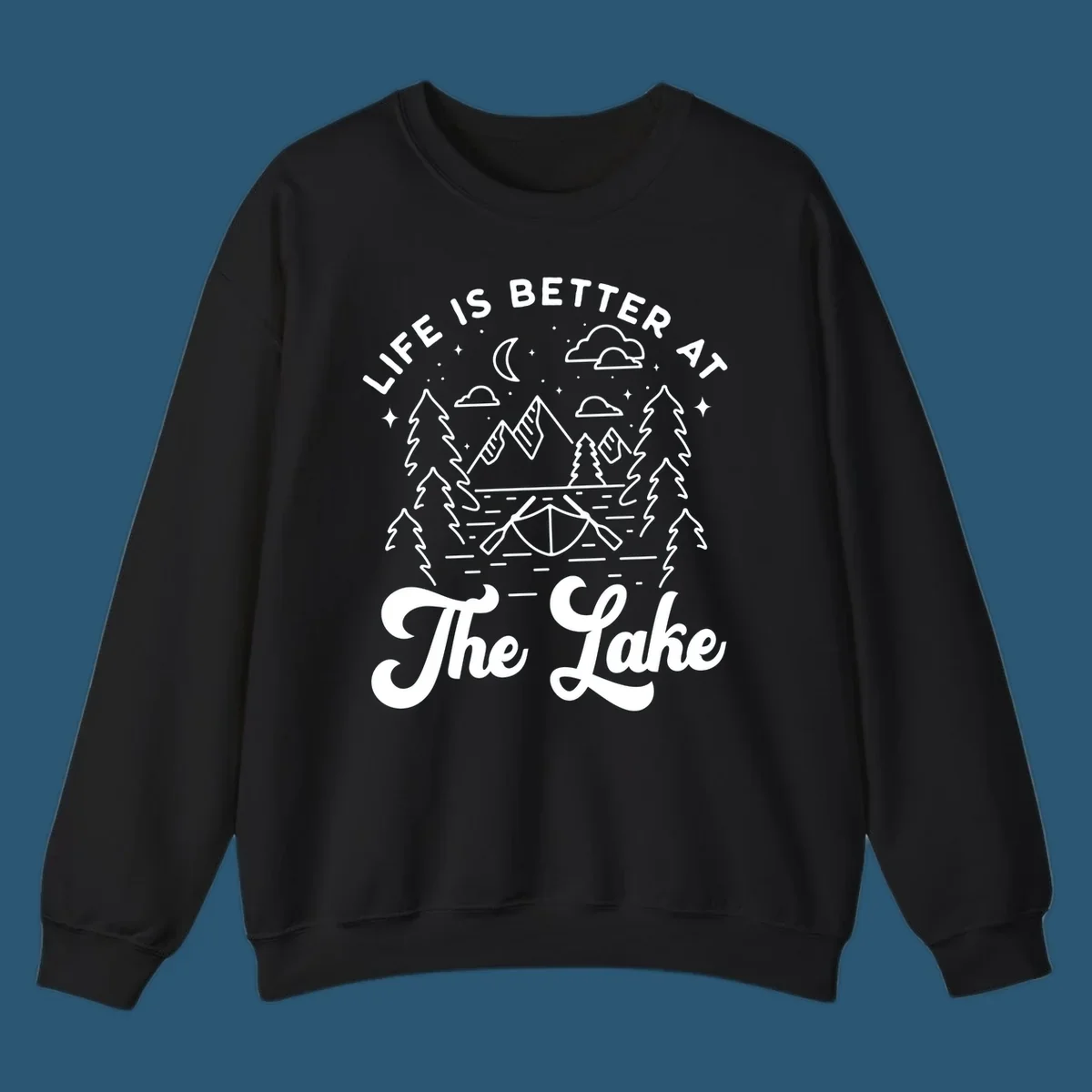 Lake life graphic with mountains, canoe, moon, and text 'Life Is Better At The Lake'.