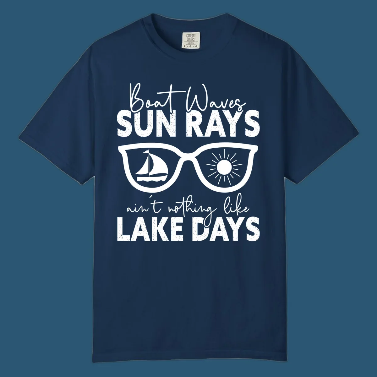 Lake days sunglasses with sailboat and sun rays, text reads Boat Waves Sun Rays Ain't Nothing Like Lake Days.
