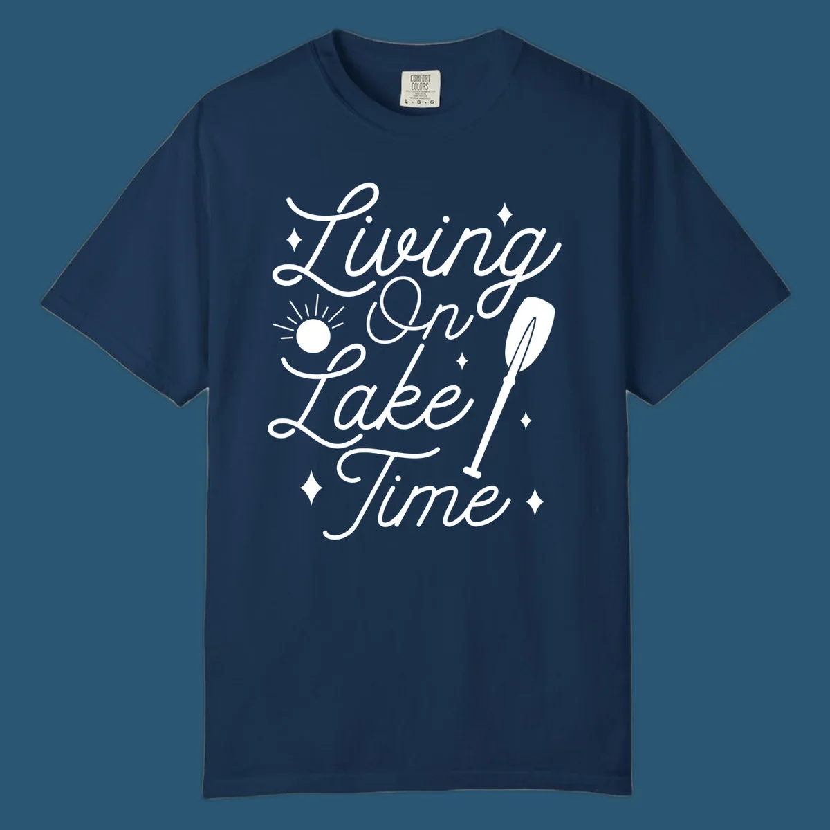 Living on lake time text with sun and paddle illustration.