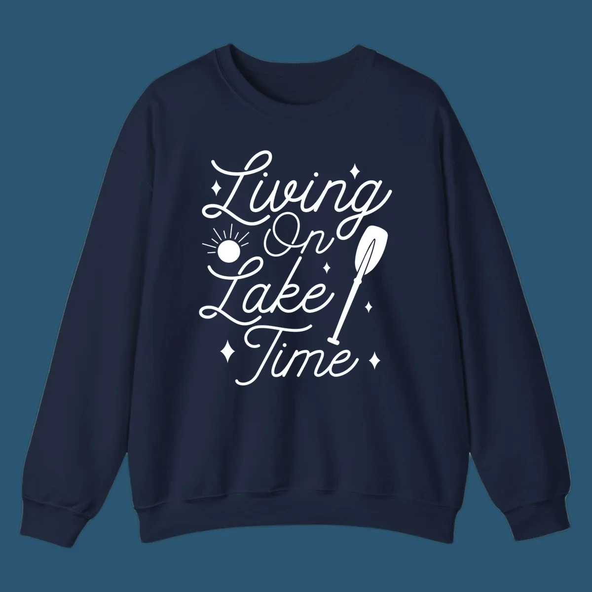 Living on lake time text with sun and paddle illustration.