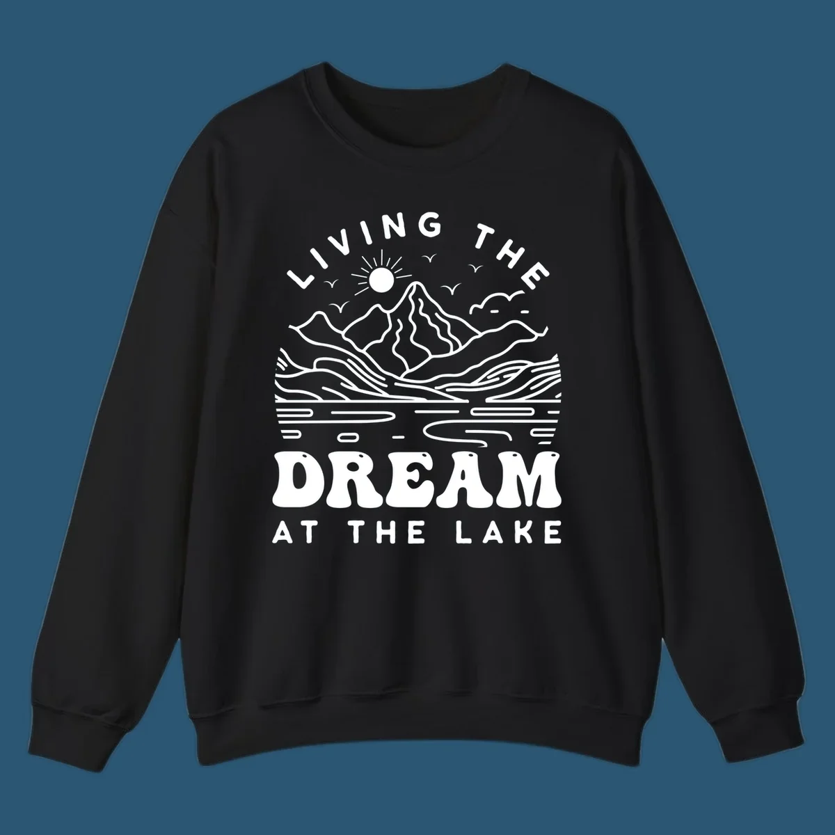 Living the dream at the lake scenic mountain landscape with sun and birds artwork.