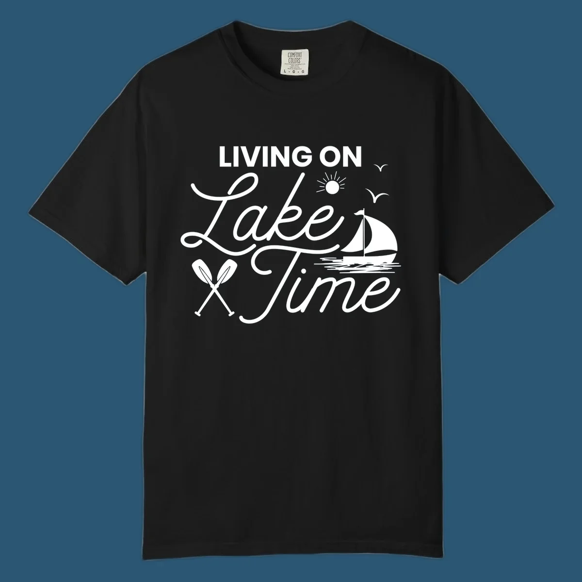 Living on lake time text with sailboat, sun, birds, and oars.