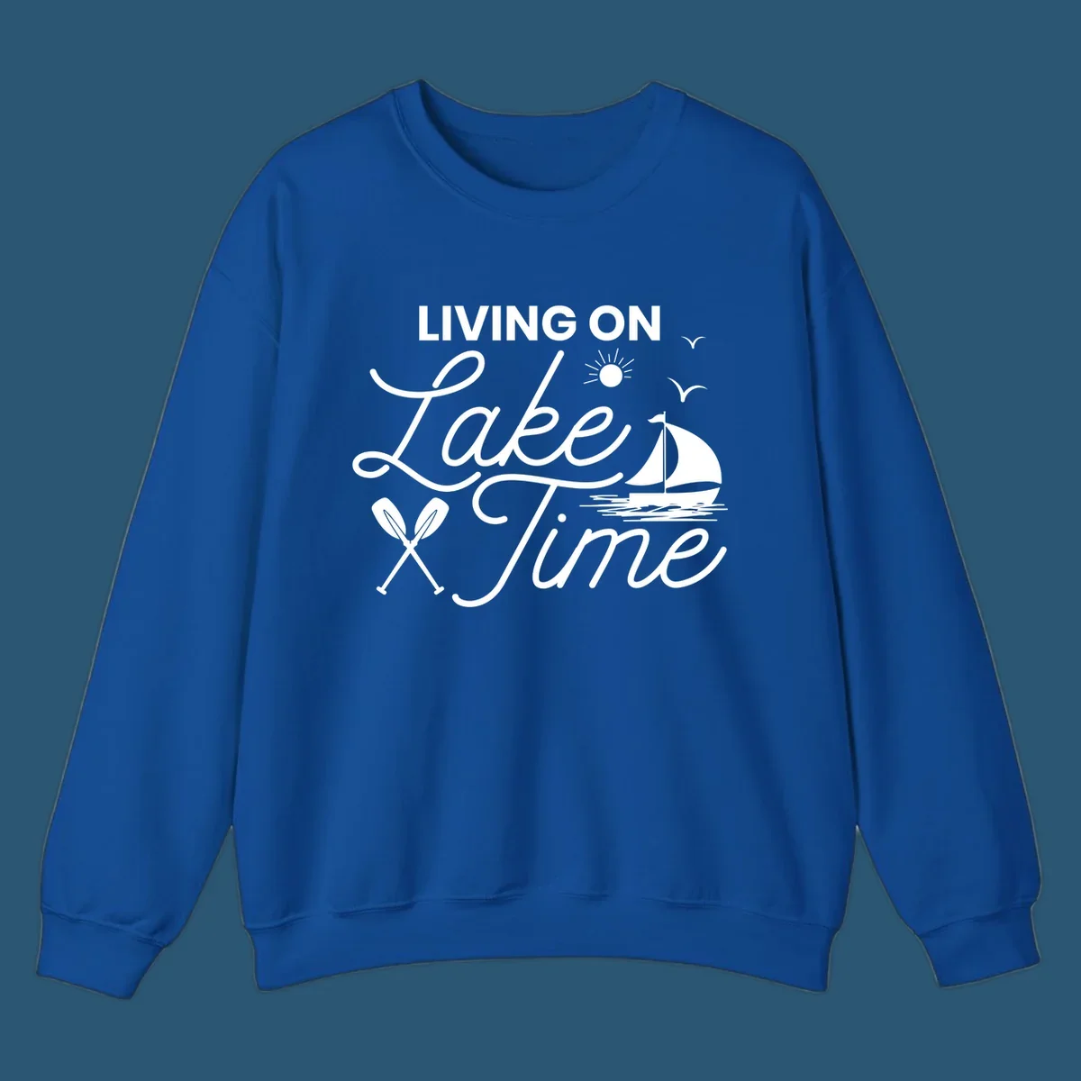 Living on lake time text with sailboat, sun, birds, and oars.