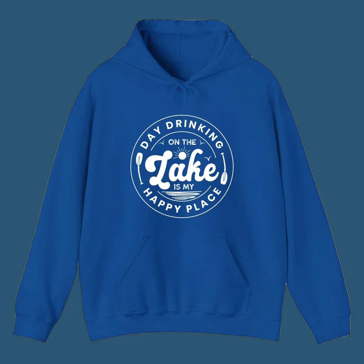 Circular badge design with text 'Day Drinking On The Lake Is My Happy Place' and lake-themed graphics.