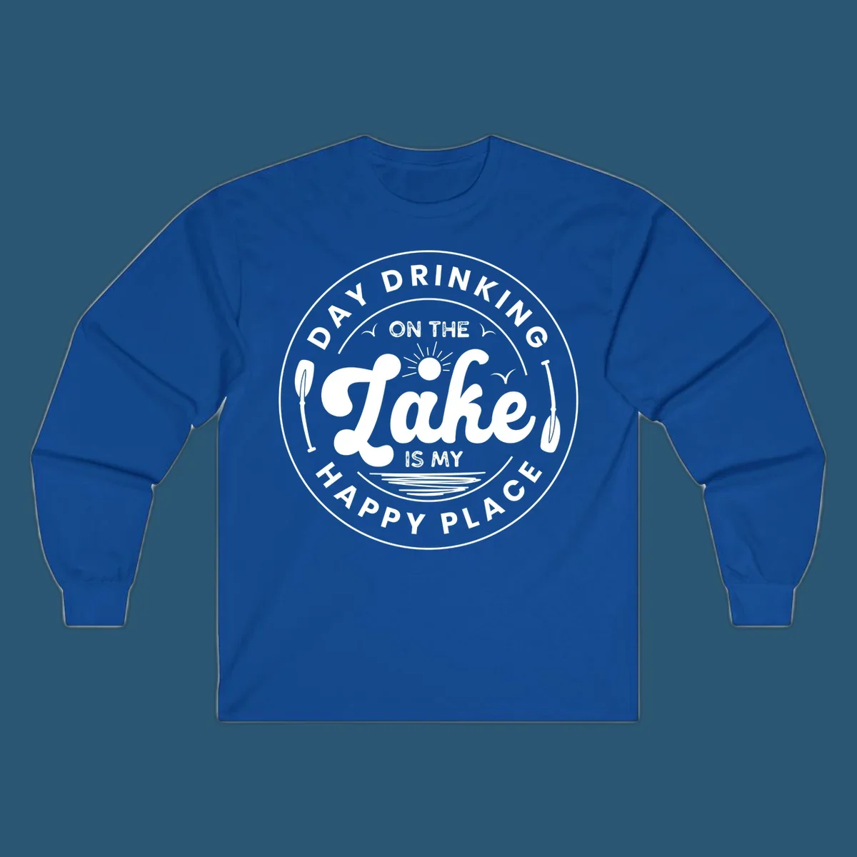 Circular badge design with text 'Day Drinking On The Lake Is My Happy Place' and lake-themed graphics.