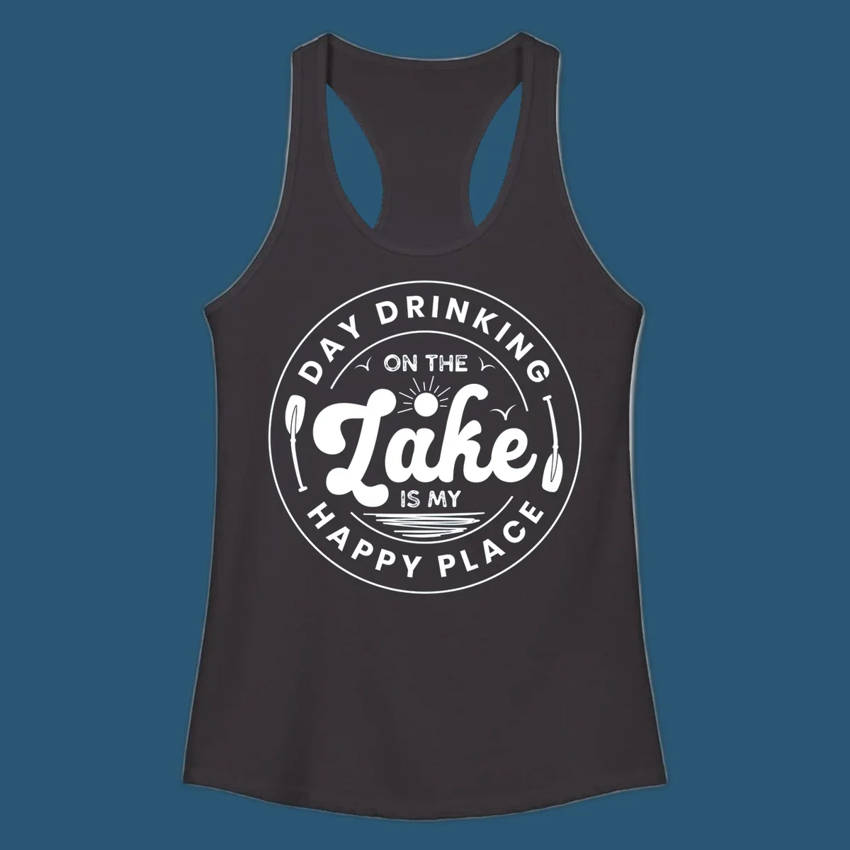Circular badge design with text 'Day Drinking On The Lake Is My Happy Place' and lake-themed graphics.