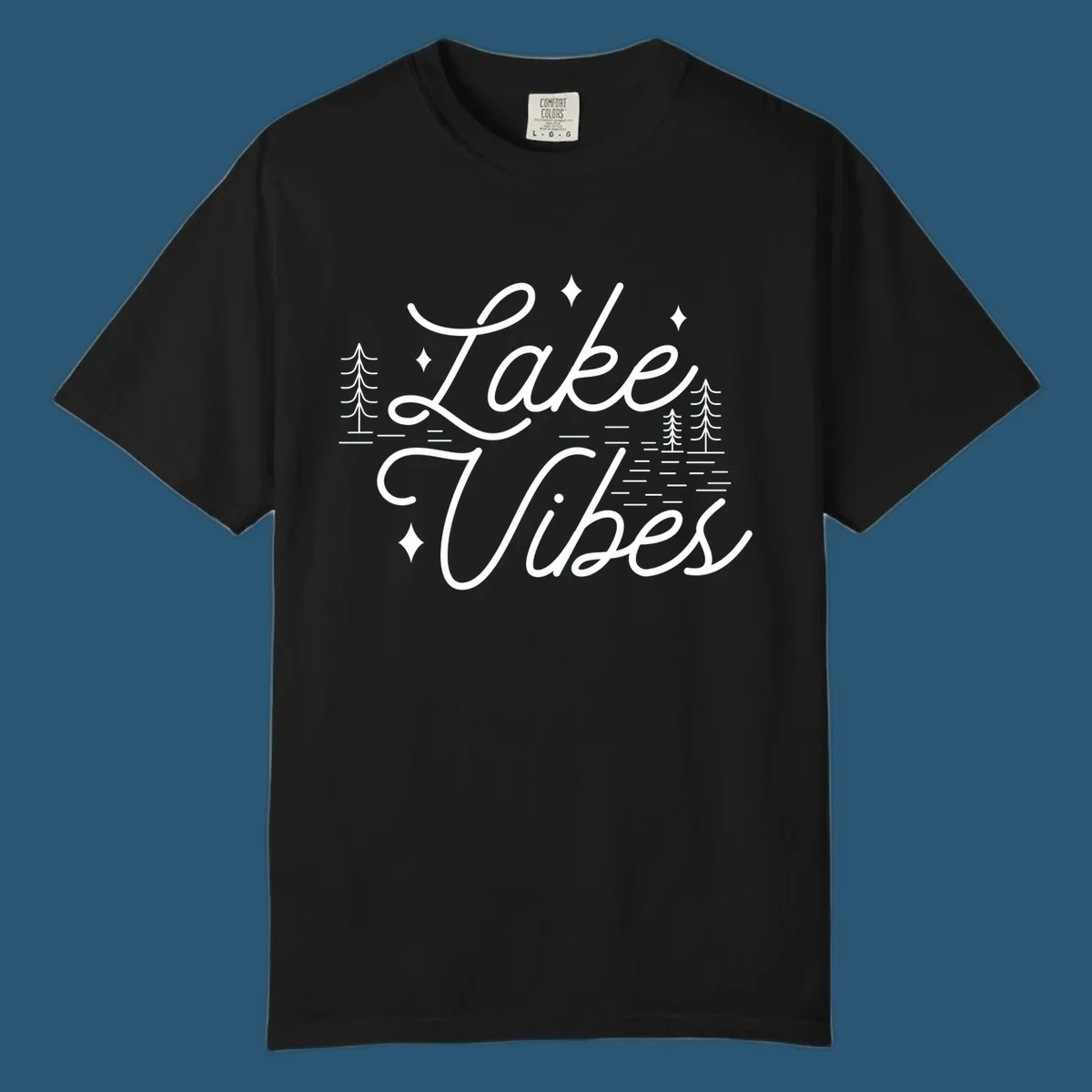 Lake Vibes text with pine trees and stars, nature-inspired lake graphic.