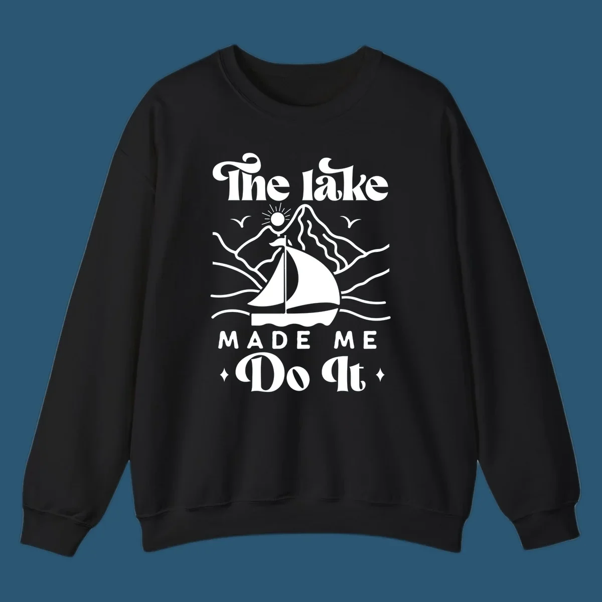 The lake Made Me Do It sailboat illustration with mountains and birds, lake-made-me-do-it concept.