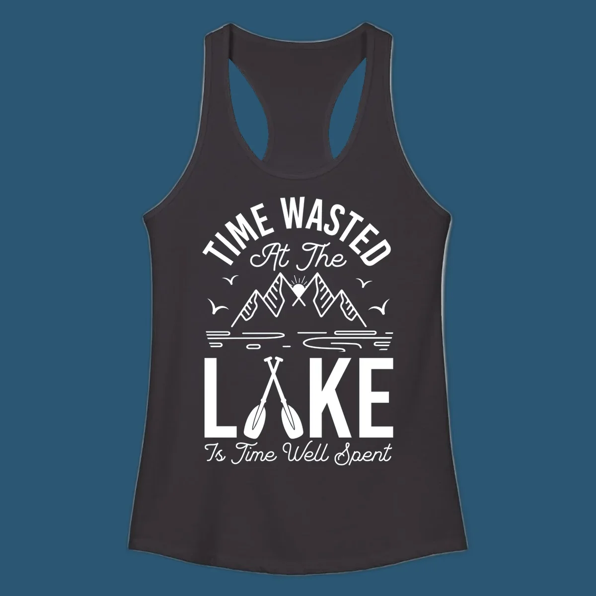 Illustration of mountains, sun, birds, and oars with text 'Time Wasted At The Lake Is Time Well Spent'.