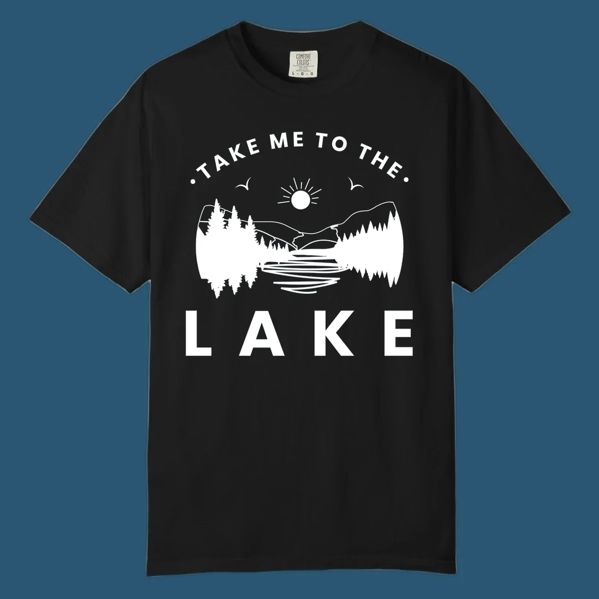 Take me to the lake mountains design with text and scenic illustration.