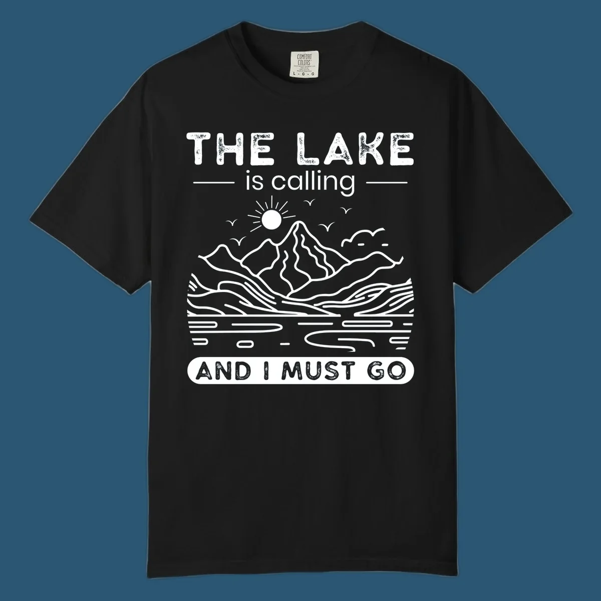 The Lake is Calling And I Must Go scenic nature design with mountains and lake.