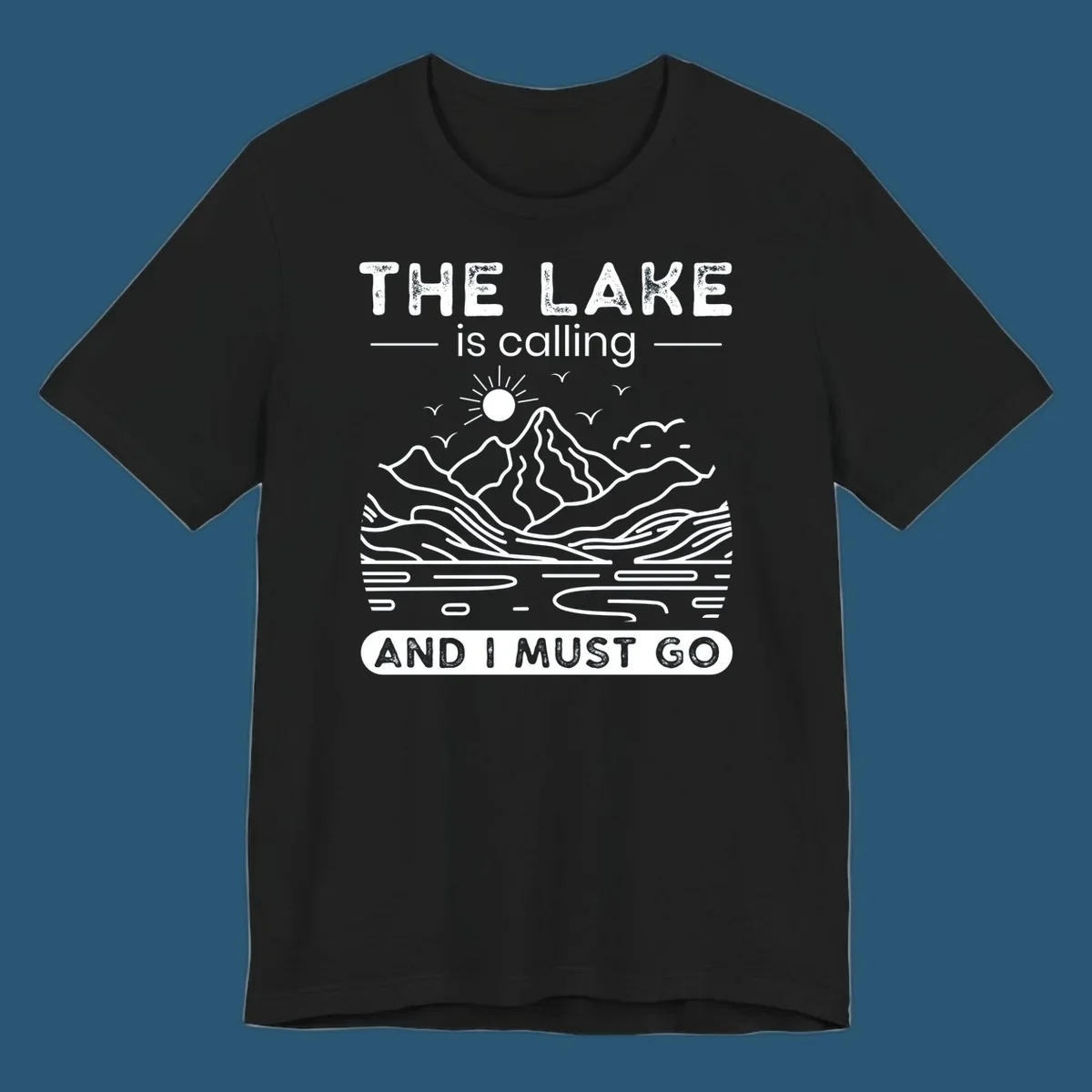 The Lake is Calling And I Must Go scenic nature design with mountains and lake.