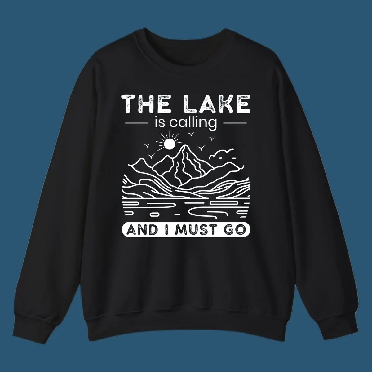 The Lake is Calling And I Must Go scenic nature design with mountains and lake.