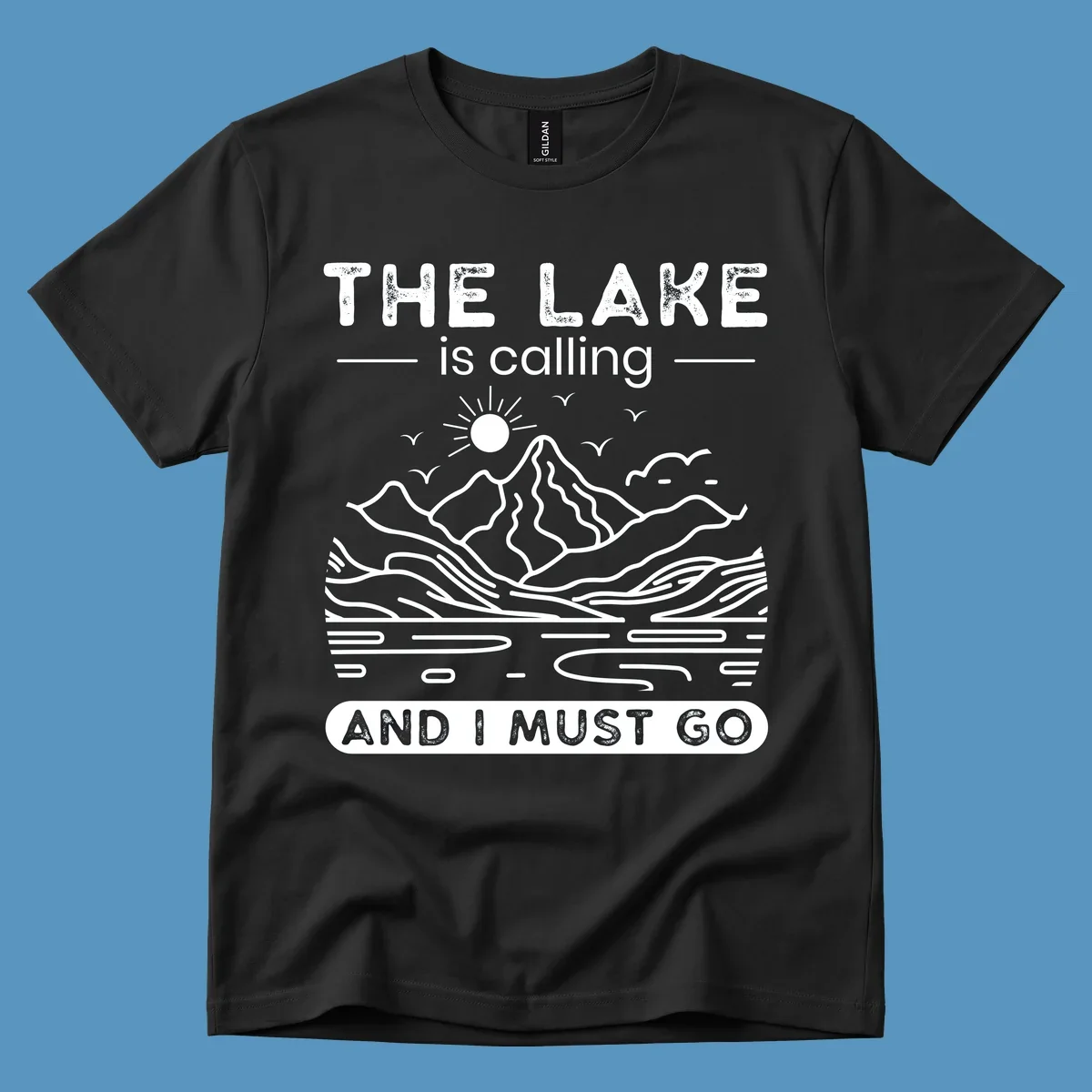 The Lake is Calling And I Must Go scenic nature design with mountains and lake.