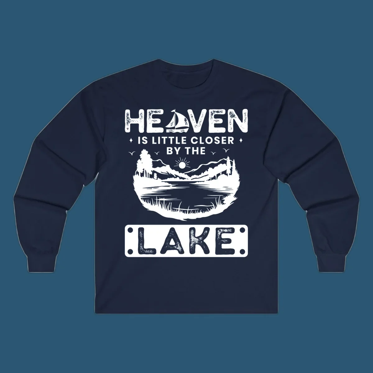 Heaven Is Little Closer By The Lake scenic design with lake, mountains, and sailboat.