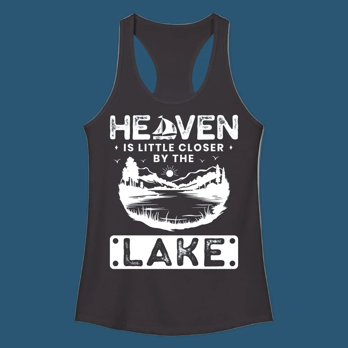 Heaven Is Little Closer By The Lake scenic design with lake, mountains, and sailboat.