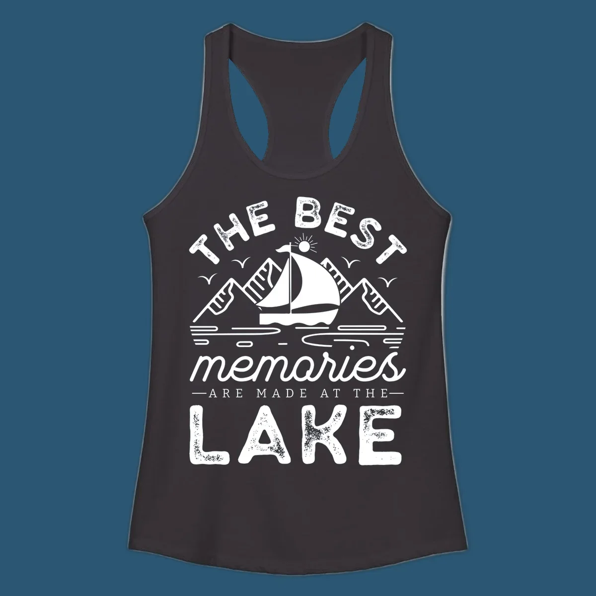 The Best Memories Are Made At The Lake design with mountains, sailboat, and text.