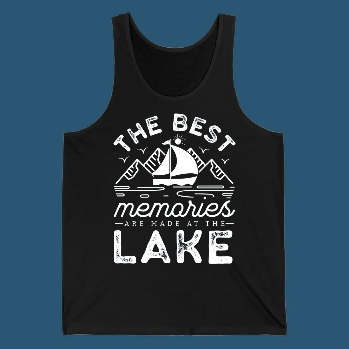 The Best Memories Are Made At The Lake design with mountains, sailboat, and text.