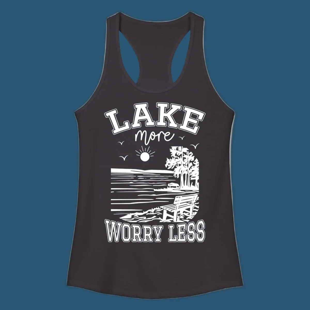 Lake More Worry Less scenic illustration with lake, trees, bench, and sun, white text on black, navy text on white.