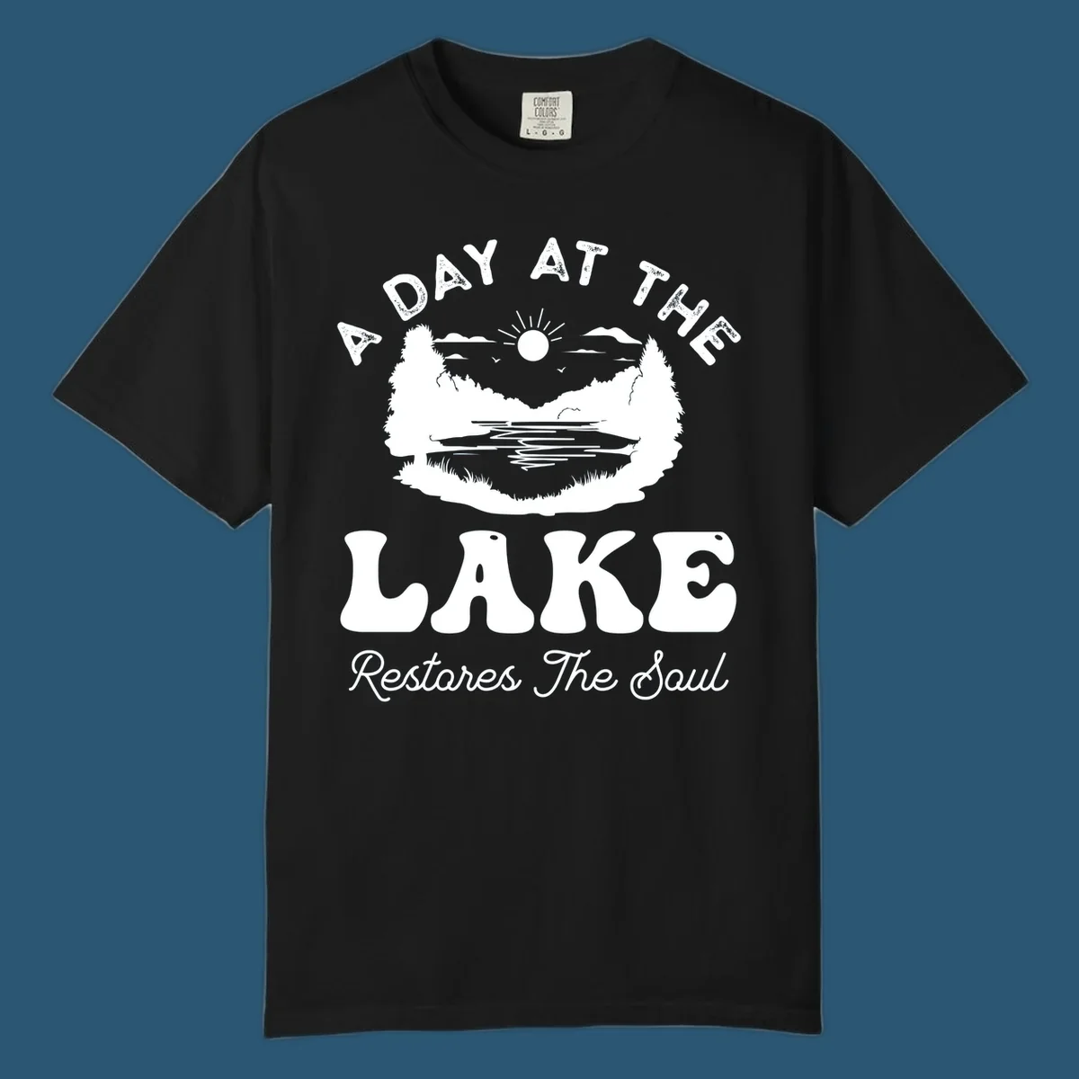 A day at the lake restores the soul graphic with lake scene and text