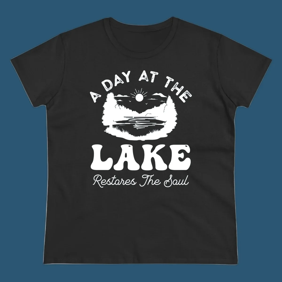 A day at the lake restores the soul graphic with lake scene and text