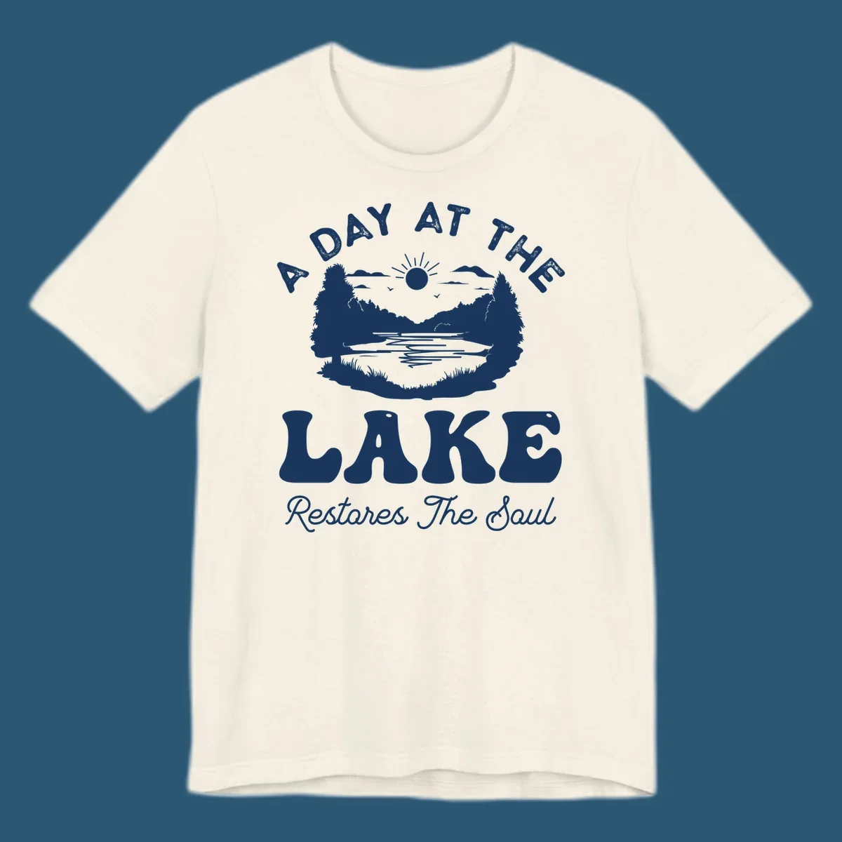 A day at the lake restores the soul graphic with lake scene and text