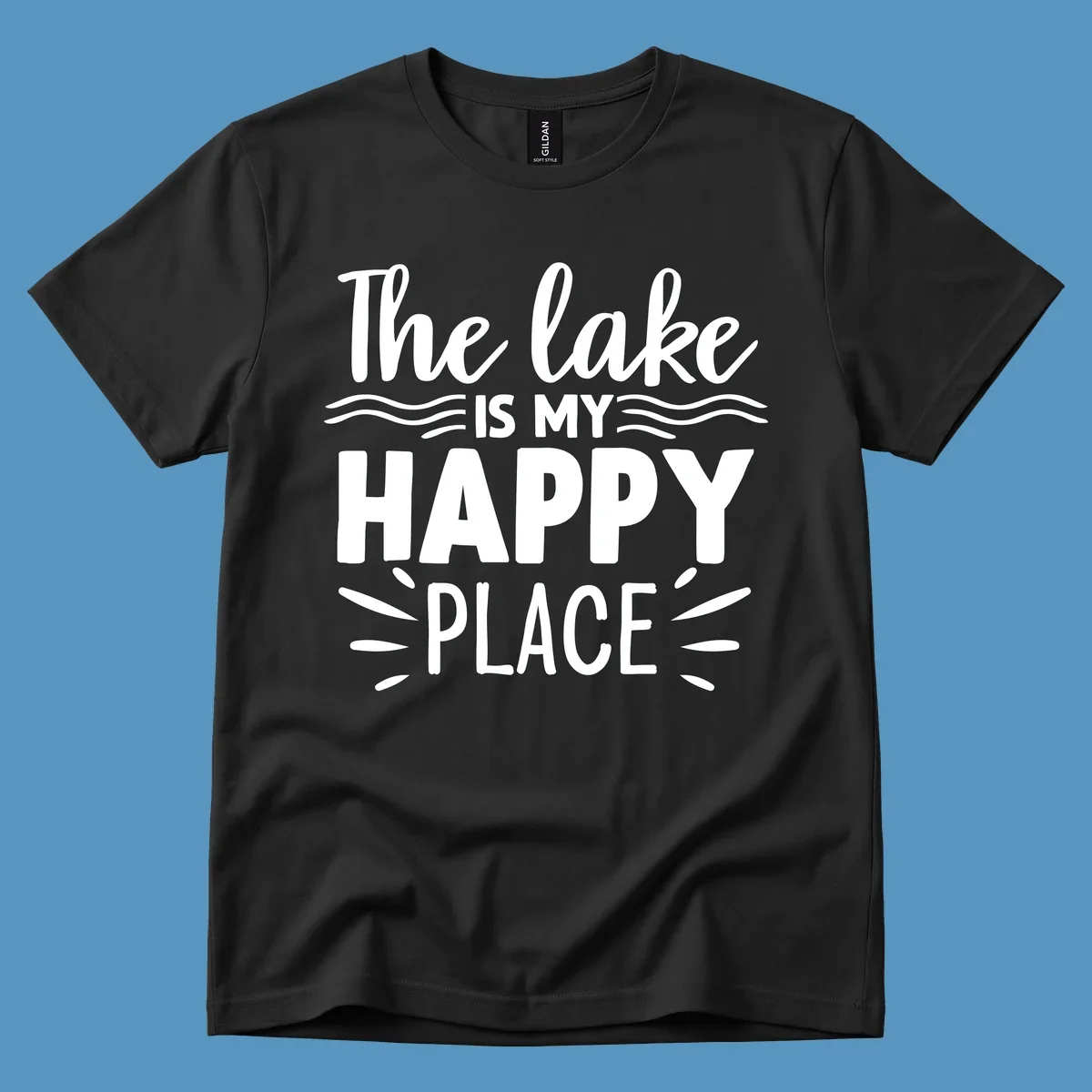 The lake is my happy place text design with wave and sun ray graphics.