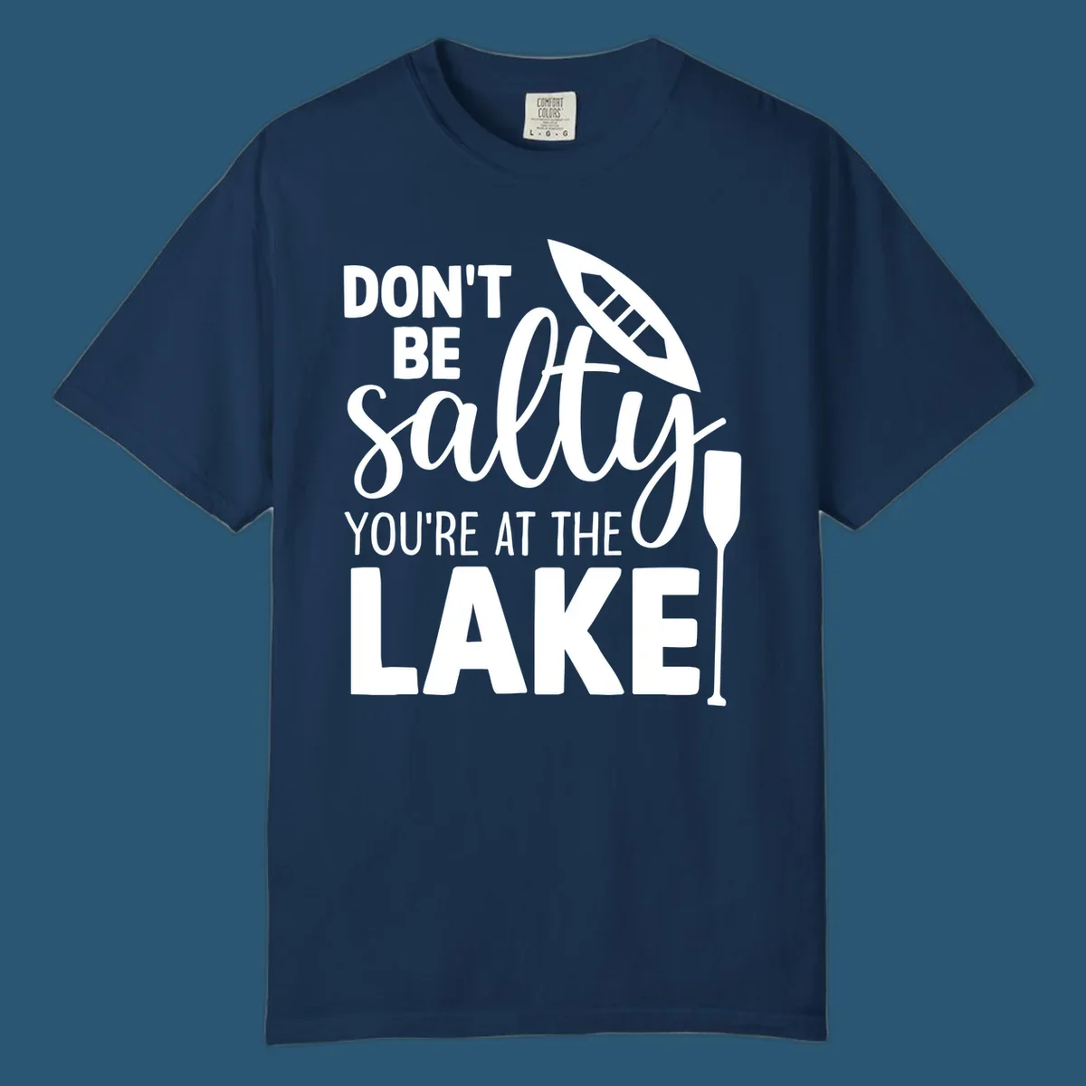 Don't be salty you're at the lake text with canoe and oar graphic.