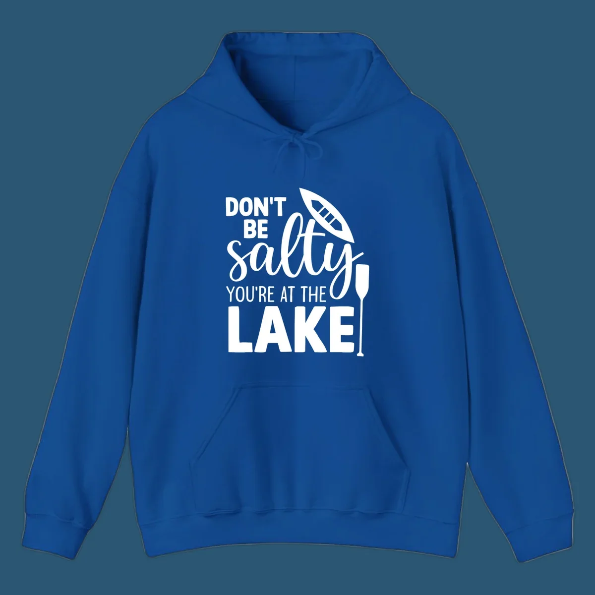 Don't be salty you're at the lake text with canoe and oar graphic.