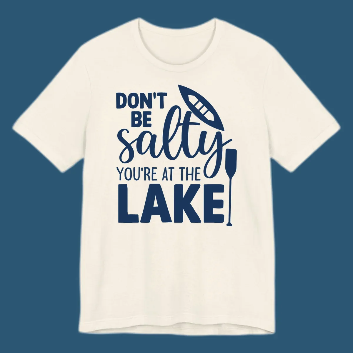 Don't be salty you're at the lake text with canoe and oar graphic.
