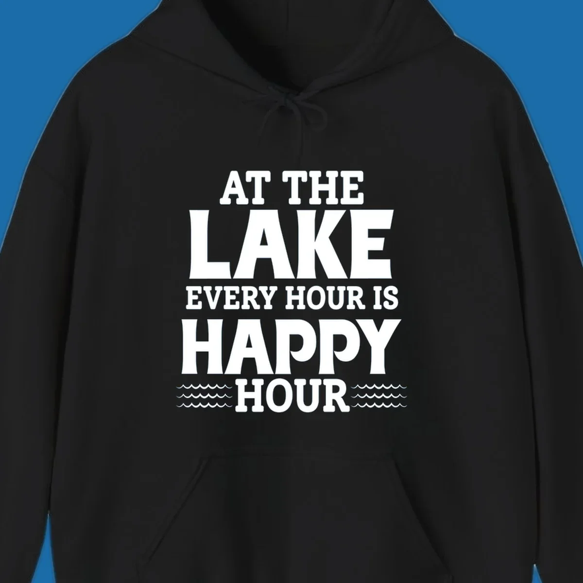 Text design 'At The Lake Every Hour Is Happy Hour' with wave accents, for lake-happy-hour apparel.